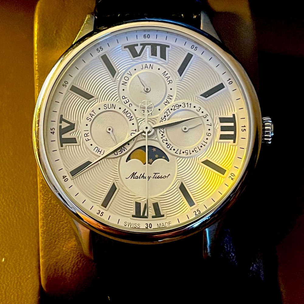 EXCELLENT CONDITION: Mathey-Tissot Edmond Moon Phase watch running perfectly.